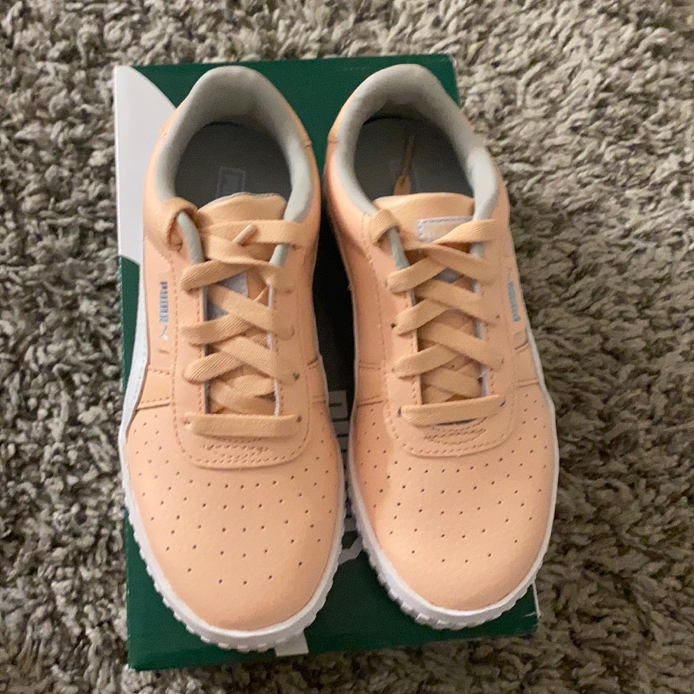 Peach Puma sneakers